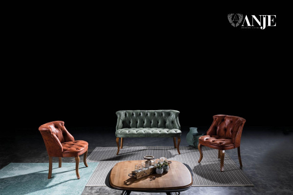 Canapé Chesterfield vert deux places en simili cuir pour salon