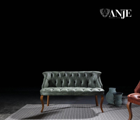 Canapé Chesterfield vert deux places en simili cuir pour salon