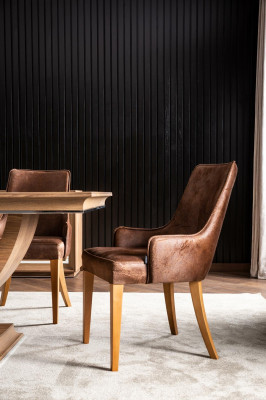 Chaise longue élégante et rembourrée de style loft - fauteuil de cuisine en cuir noir