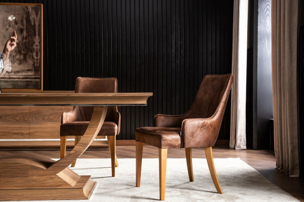 Chaise longue élégante et rembourrée de style loft - fauteuil de cuisine en cuir noir