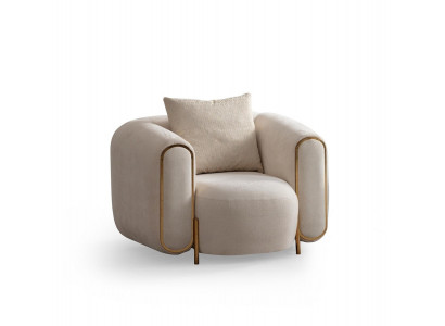 Fauteuil de luxe beige style salon recouvert de textile moderne