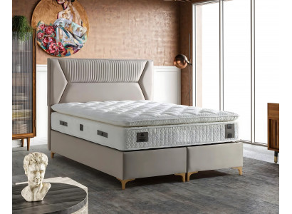 Lit élégant beige avec matelas en textile et en bois