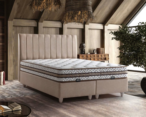 Lit en textile beige avec un matelas élégant