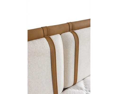 Des couleurs claires et neutres rendent le lit polyvalent.