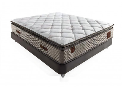 Un lit moderne avec matelas embellit n'importe quelle chambre.