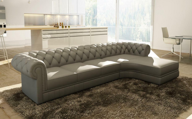 Siège d'angle classique en cuir pour un salon de suite Chesterfield en cuir.