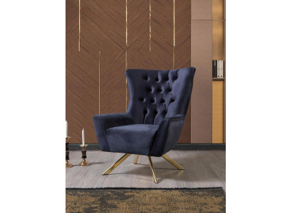 Luxueux fauteuil Chesterfield bleu avec revêtement en velours pour le salon
