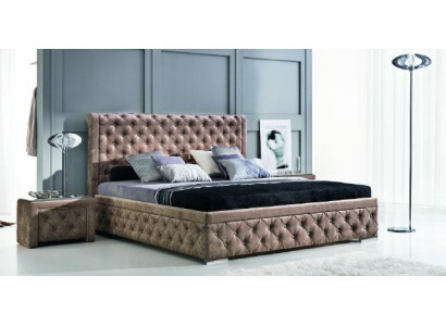 Un luxueux lit Chesterfield dans un style contemporain élégant.