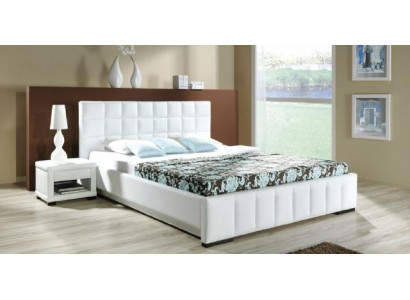 Un lit de designer de luxe dans un style contemporain sophistiqué de la plus haute qualité.