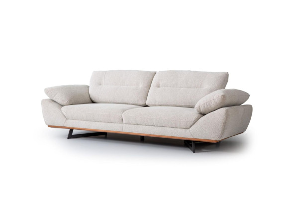 Canapé design confortable 3 places en tissu blanc dans le salon