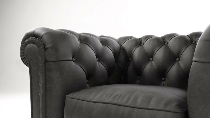 Élégante chaise Chesterfield avec un revêtement en tissu pour la télévision, le salon et le club.