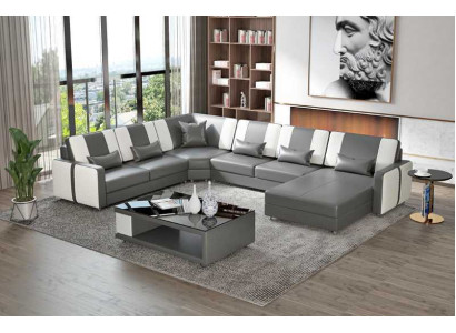 Grand canapé d'angle en cuir gris en forme de U pour un grand salon moderne.