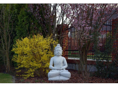 Sculpture de Bouddha en effet pierre. Grande sculpture décorative pour une figure de jardin.