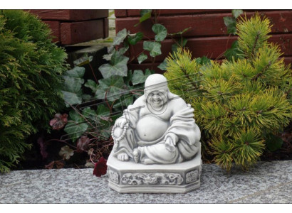 Sculpture de Bouddha en effet pierre. Grande sculpture décorative en forme de figure de jardin.