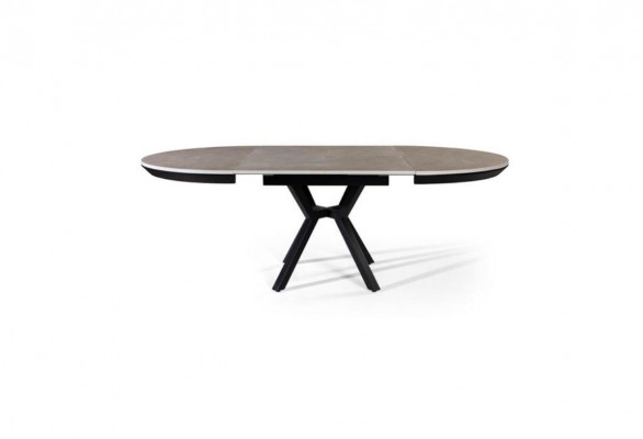 Table ronde extensible en bois gris pour salle à manger.