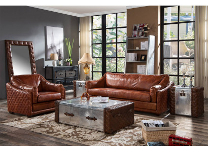 Canapé Chesterfield 3 places en cuir vintage brun dans le style des meubles Chesterfield. Trois places.