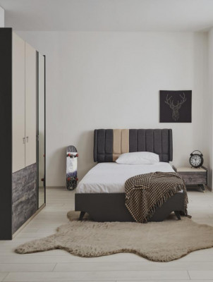 Ensemble de chambre luxueux et stylé comprenant le lit Delta, la table de chevet et l'armoire.