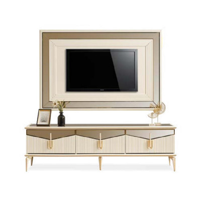 Meuble télévision murale beige en trois pièces, comprenant un meuble mural, un support pour télévision, une table basse et un meuble bas doré.