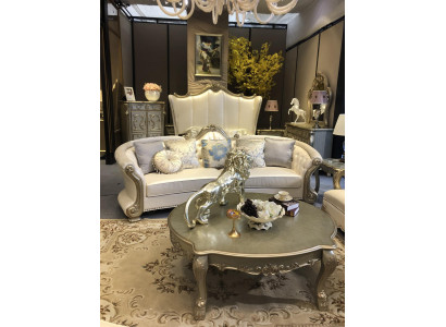 Canapé rond en bois sculpté quatre places Chesterfield en cuir vivant