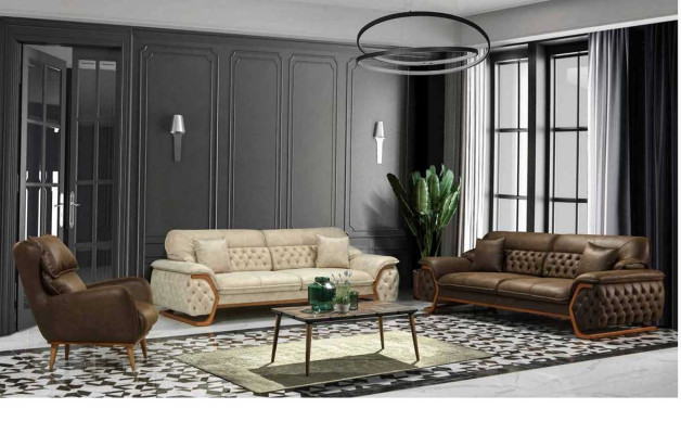 Canapé luxueux Chesterfield à trois places avec dossier réglable.