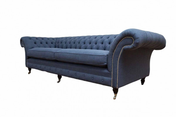 Canapé Chesterfield design 4 places en tissu bleu pour salon