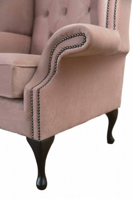 Fauteuil à ailes en velours, canapé rembourré design Chesterfield en tissu.