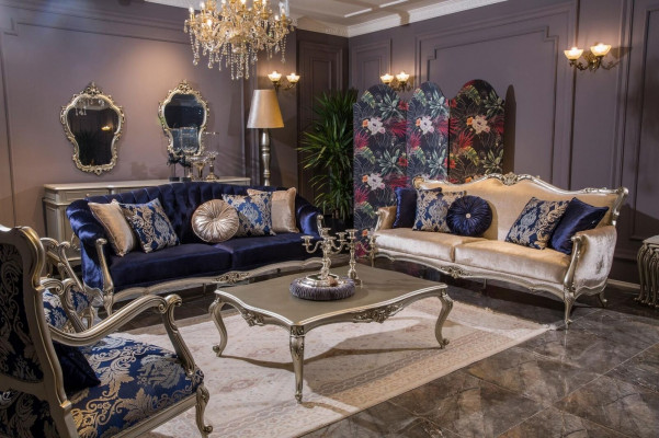 Luxueux fauteuil une place à dossier rembourré en tissu bleu à motif floral style baroque