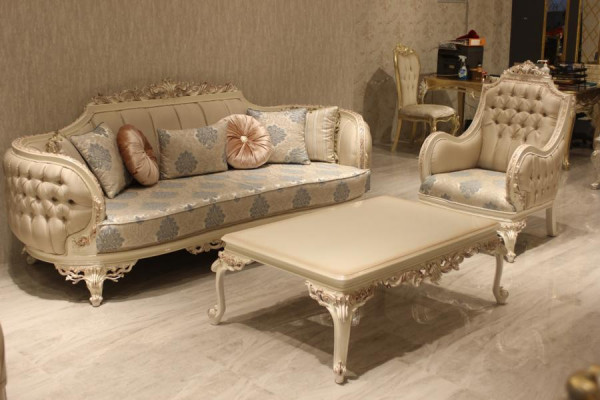 Ensemble de canapé moderne avec des meubles rembourrés tendance et un fauteuil confortable ainsi qu'une table basse
