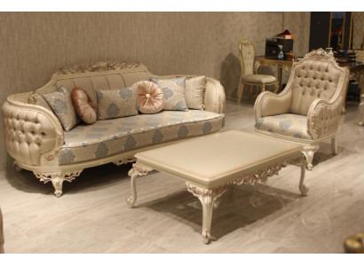 Salon confortable exclusif avec canapé 3 places moderne et 2 fauteuils design.