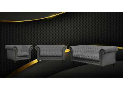 Un canapé Chesterfield trois places en tissu de luxe pour meubles.