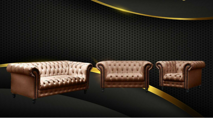 Un canapé Chesterfield trois places en tissu de luxe pour meubles.