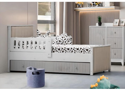Lit d'enfant pratique de couleur grise pour de douces heures de sommeil. Luxueux