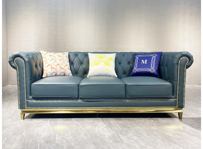 Canapé Chesterfield Trois places en textile avec structure en acier inoxydable