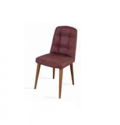 Un fauteuil rose d'origine sur pieds en bois pour votre salle à manger nouveau modèle