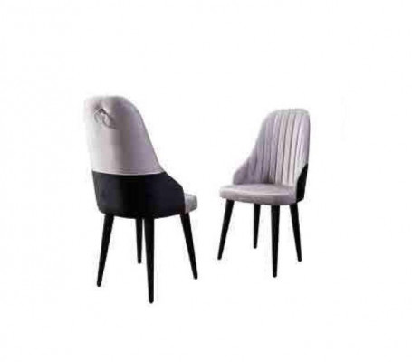 Chaise rose clair en bois sur des pieds noirs pour la salle à manger nouveau modèle