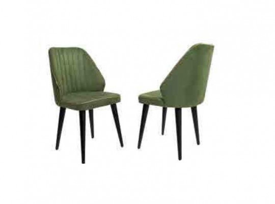 Chaise verte sur des pieds en bois noirs pour la salle à manger, nouveau modèle de confortables.