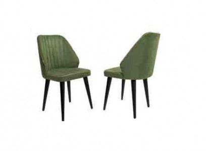 Chaise verte sur des pieds en bois noirs pour la salle à manger, nouveau modèle de confortables.