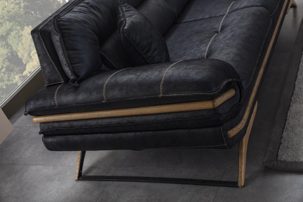 Canapé 3 places élégant exclusif de couleur noire de luxe dans le salon