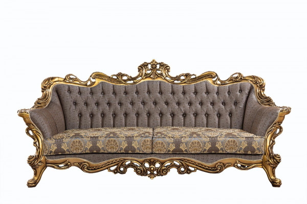 Canapé Chesterfield classique à trois places avec cadre doré.
