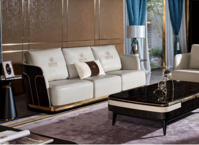 Trois canapés en cuir de designer blancs