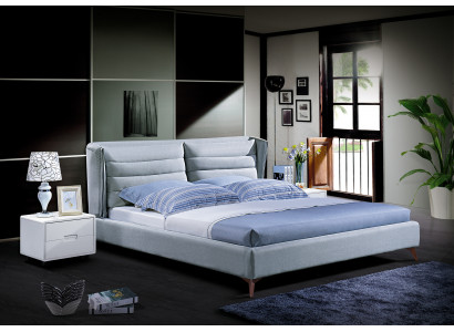 Lit design en bois. Cadre de lit double de luxe moderne pour chambre d'hôtel.