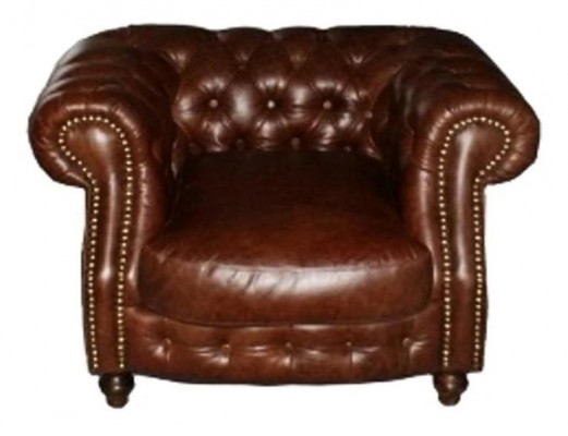 Canapé d'angle Chesterfield marron dans le salon de canapé d'angle rembourré.