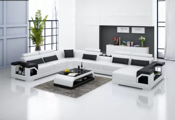 Canapé d'angle moderne en cuir rembourré pour salon.