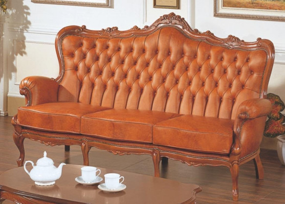 Canapé 3 places de luxe en cuir brun de style Art déco.