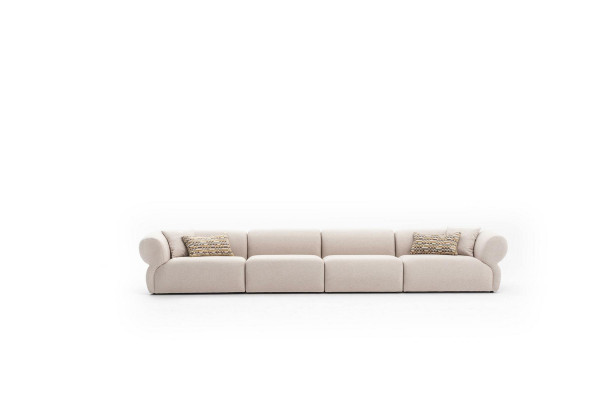 Grand canapé attrayant à six places de couleur beige, au design simple et fabriqué à partir de matériaux de qualité supérieure.