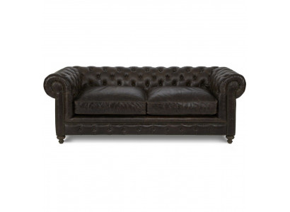 Moderne canapé de luxe noir Chesterfield trois places pour le salon.