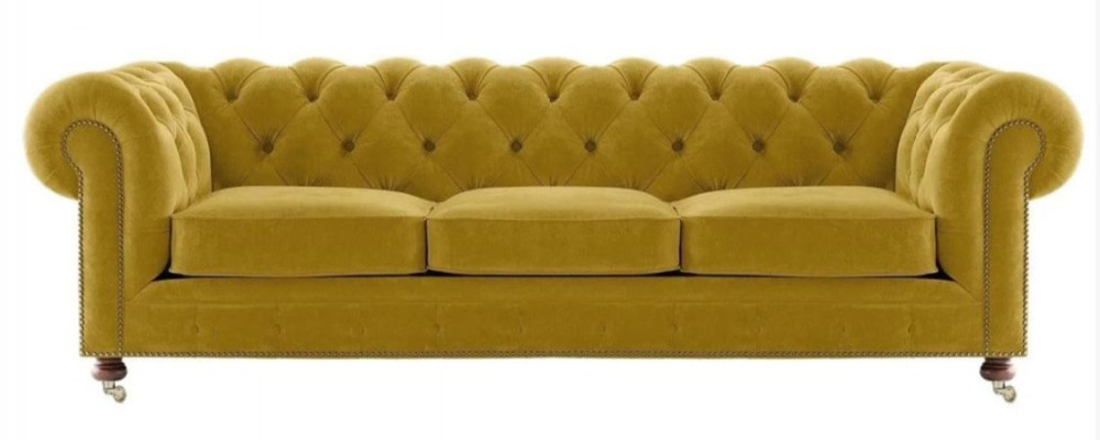 Luxueux canapé trois places en velours Chesterfield jaune pour hôtel salon pratique.