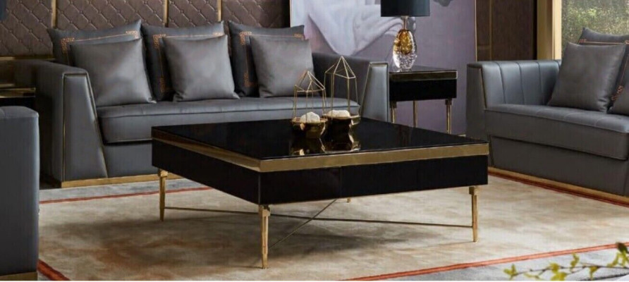 Trois canapés modernes Trois canapés rembourrés en cuir à trois places