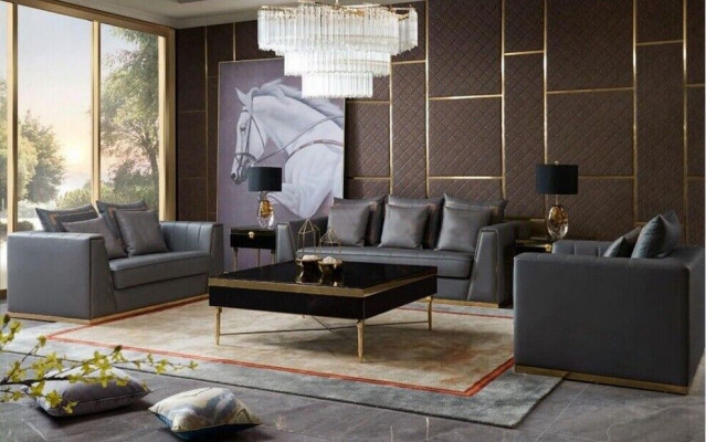 Trois canapés modernes Trois canapés rembourrés en cuir à trois places