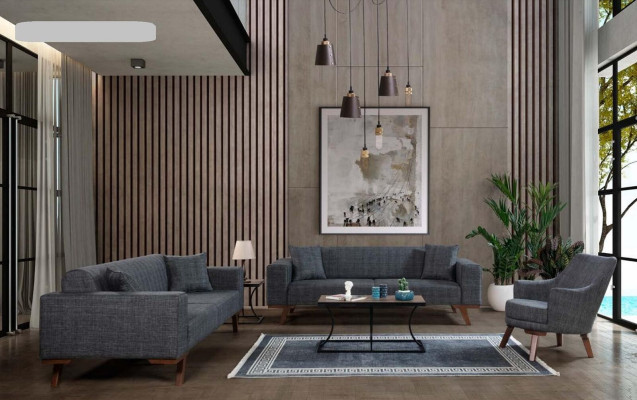 Fauteuil de salon design une place moderne en tissu gris.